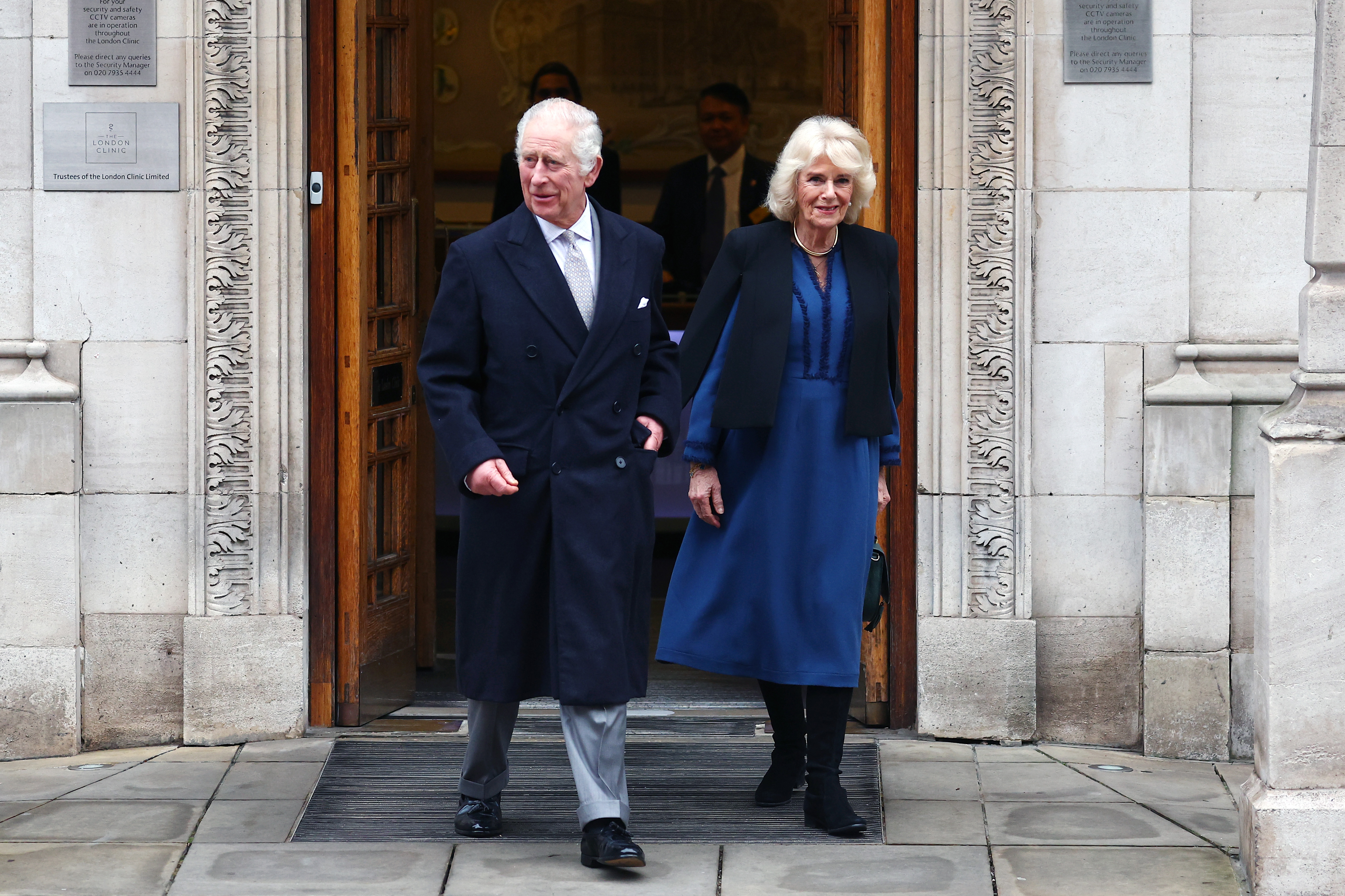 King Charles and Queen Camilla walking