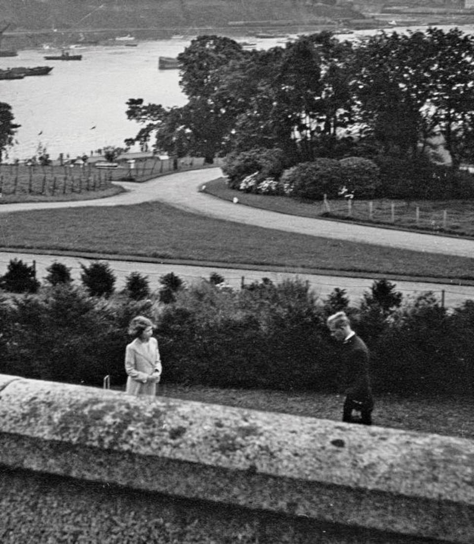 Princess Elizabeth, then aged 13, is seen meeting an 18-year-old Prince Philip at Dartmouth Naval College in July 1939