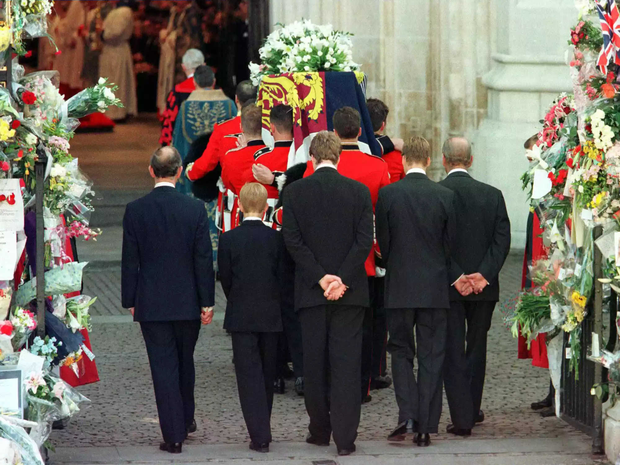 Prince Charles, Prince Harry, Earl Spencer, Prince William and the Duke of Edinburgh follow the coffin of Diana, Princess of Wales, as it is being carried into Westminster Abbey for a funeral service.