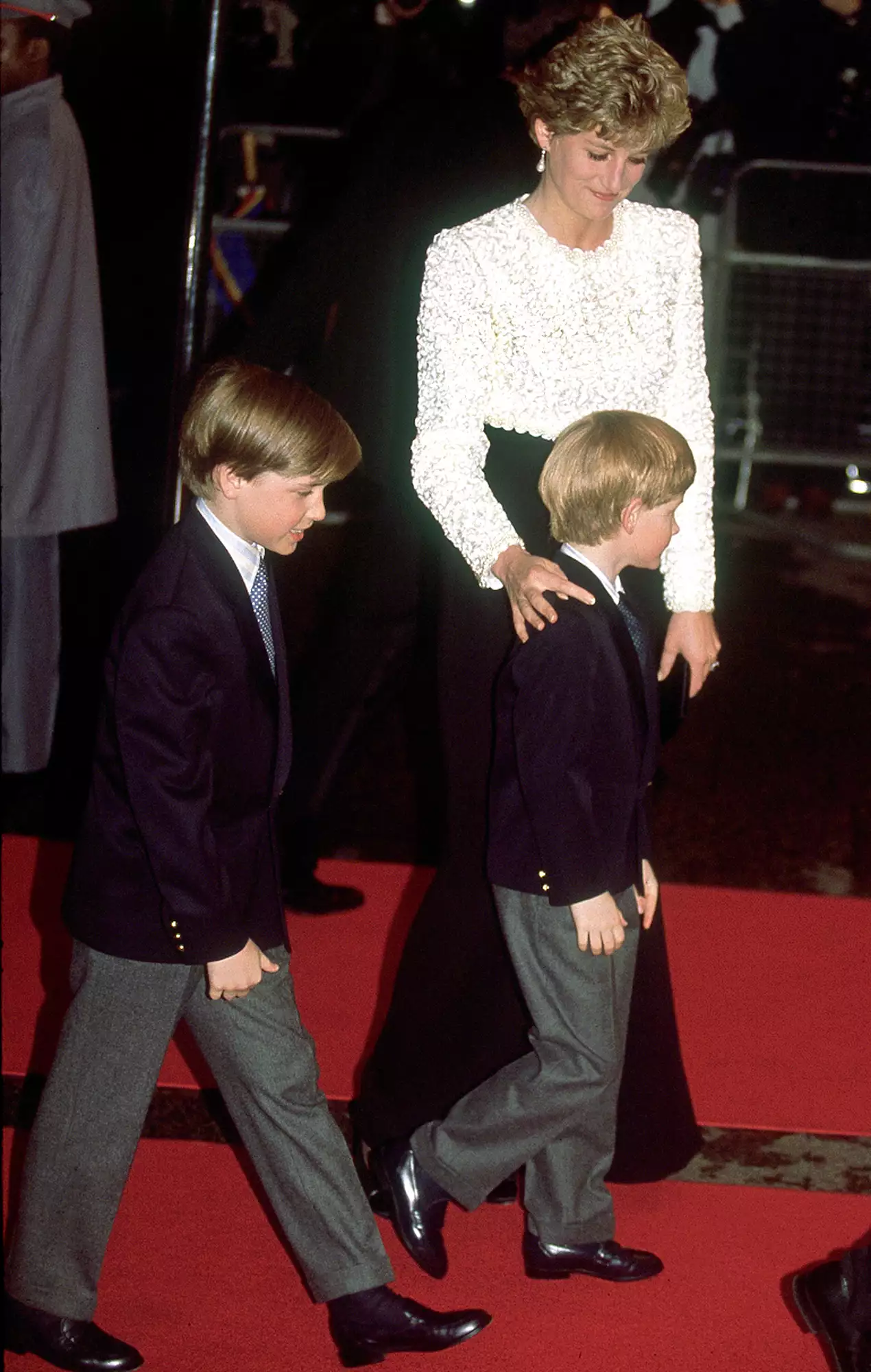 The Princess of Wales and her children, Princes William and Harry arriving for the premiere of 'Hook' in April, 1992.