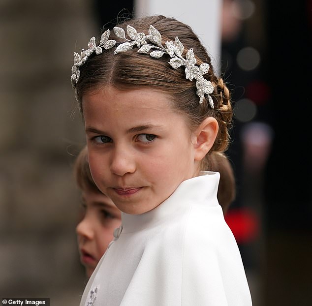 Snaps of Charlotte at the Coronation show her staring into the distance with her large green eyes. As she took it all in, many saw glimpses of Diana in her