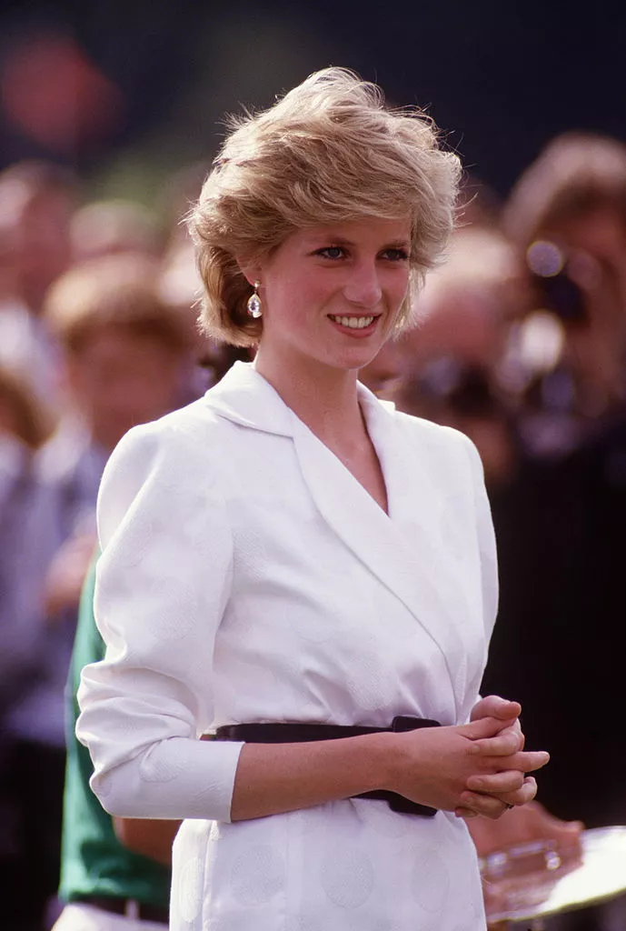 Diana Princess of Wales watches Prince Charles playing polo at Guards Polo Club on Smiths Lawn in Windsor, Berkshire in July 1986.