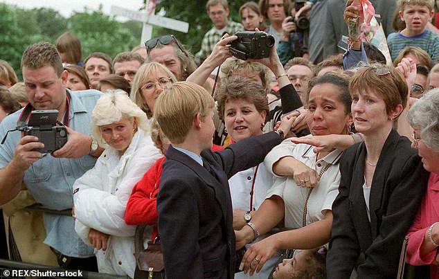 The young prince shook hands with the crowd outside of her former home, Kensington Palace