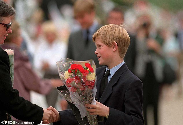 A 12-year-old Prince Harry greets royal fans following the death of his mother outside of Kensington Palace